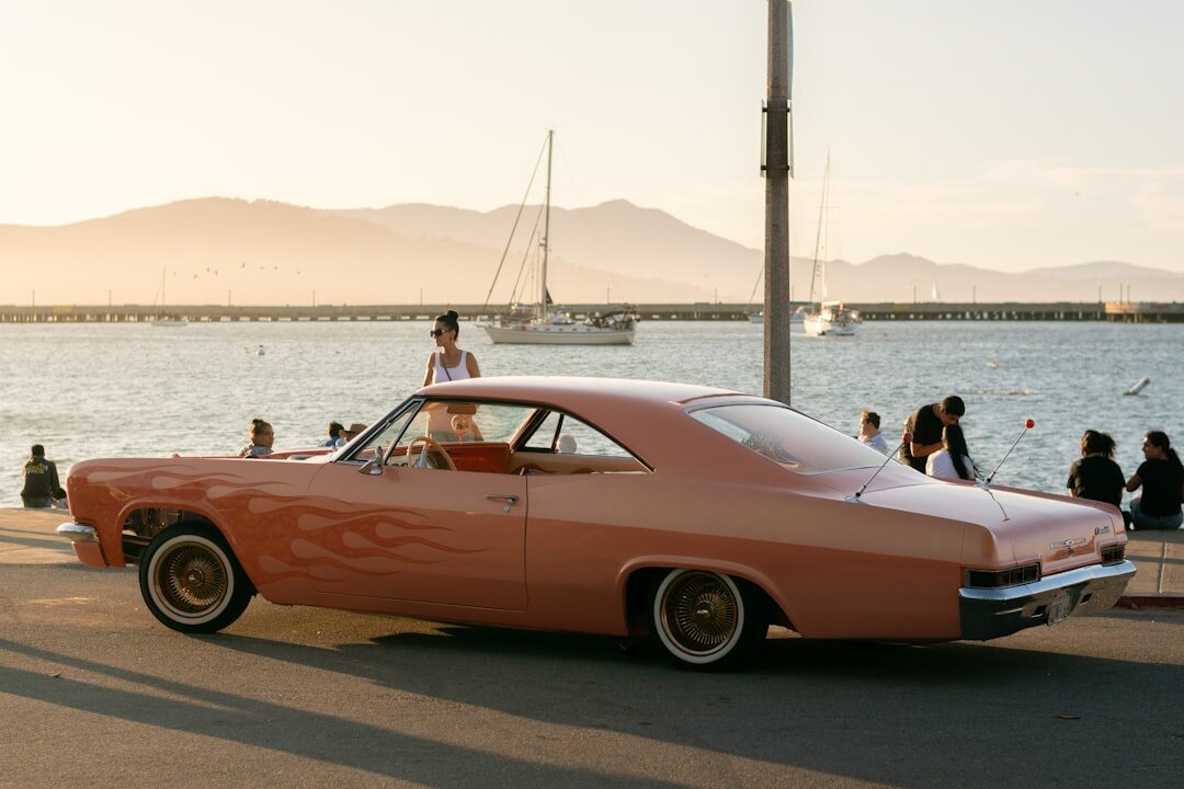 Convertible classic car parked near the beach in Punta del Este during summer