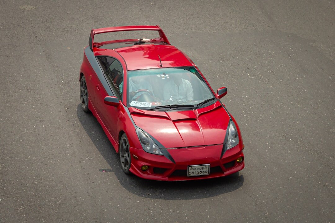 red sports car on road