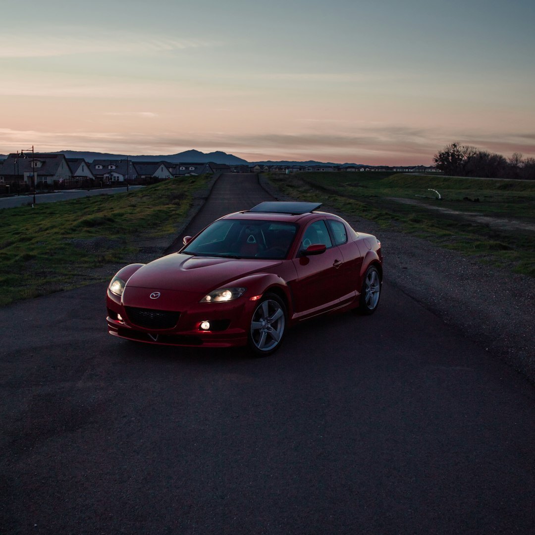 red sports car on road