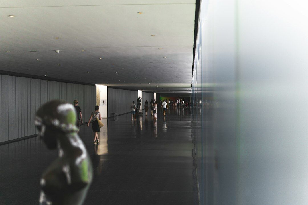 Private collection of luxury automobiles displayed in a modern hall